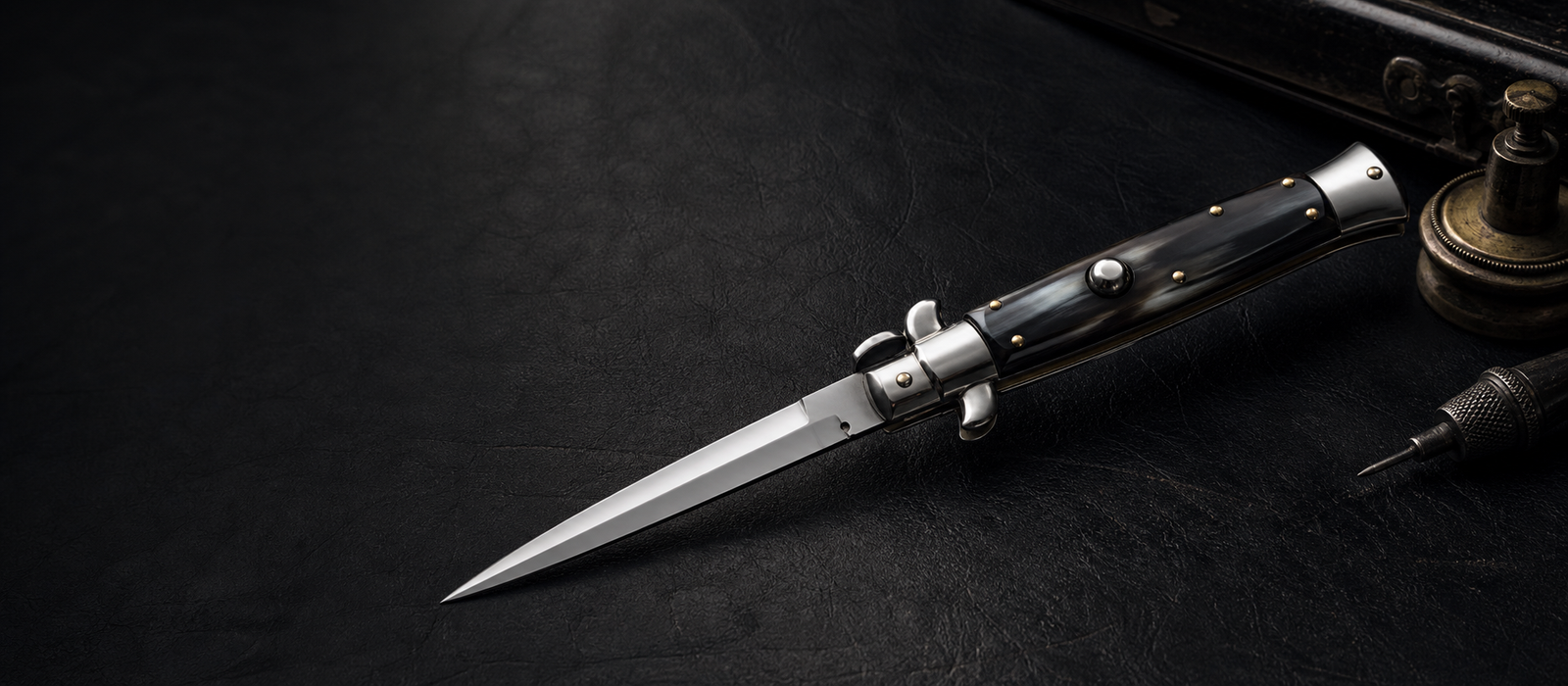 SEWARD Italian stiletto on a dark leather workbench